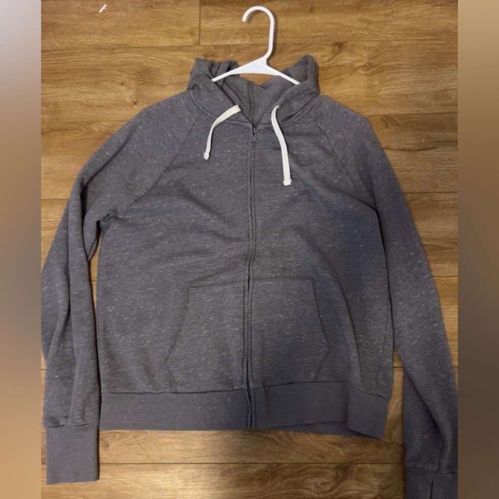 Gray zip up with white drawstrings